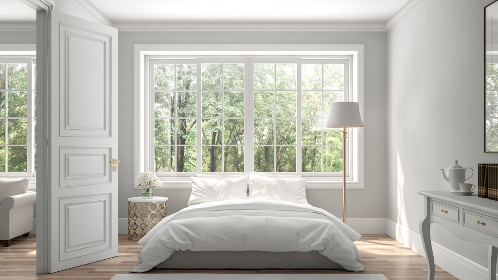 Large window above a bed.