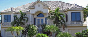 Exterior of large Florida home with hurricane windows