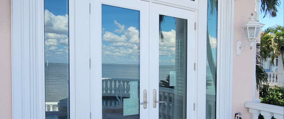 2 3 closed french doors with the reflection of the sky